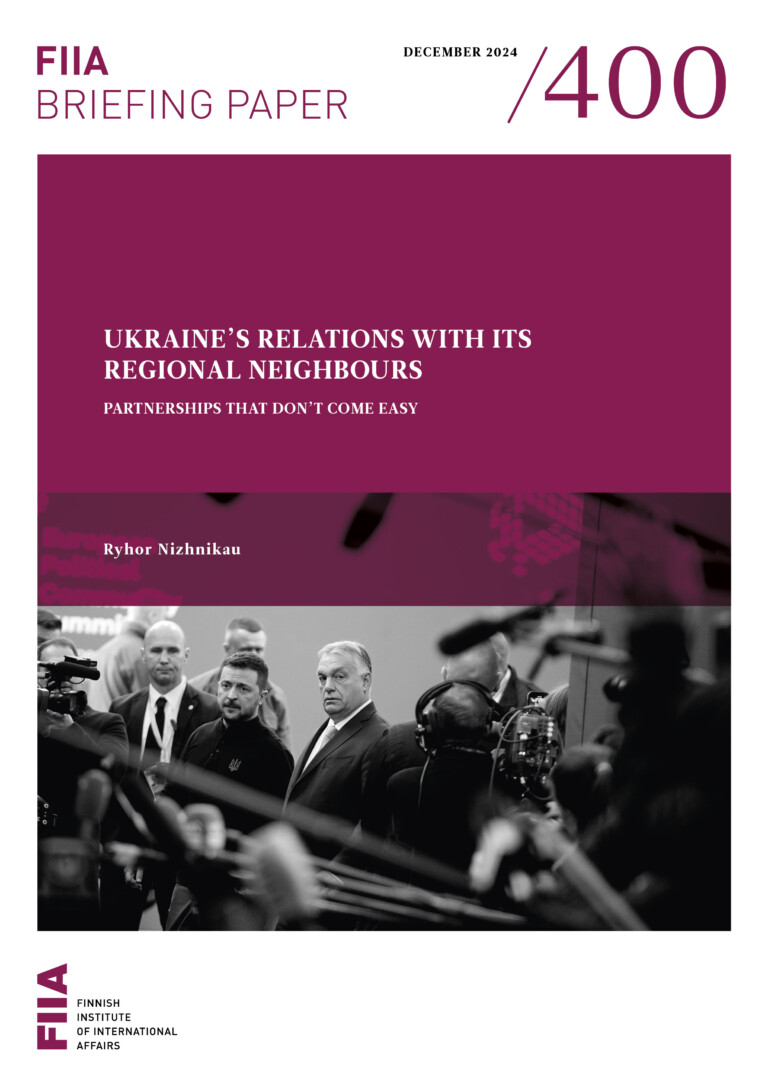 Cover page depicting the title of the publication, name of the author, and a black-and-white photo of Volodymyr Zelenskyy and Viktor Orbán surrounded by press.