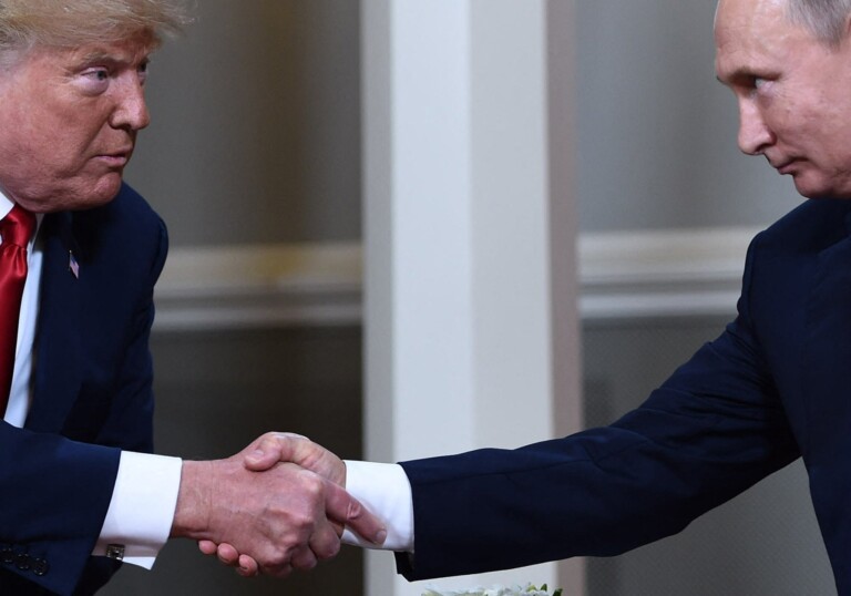 LKS 20250212 (FILES) In this file photo taken on July 16, 2018, US President Donald Trump (L) and Russian President Vladimir Putin shake hands ahead a meeting in Helsinki. Putin told his US counterpart Donald Trump in a phone call on February 12, 2025 that "peaceful negotiations" on ending the Ukraine conflict were possible, the Kremlin said. "President Putin ... agreed with Trump that a long-term settlement could be reached through peaceful negotiations," the Kremlin said in its readout of the call, which it said lasted almost one-and-a-half hours. LEHTIKUVA / AFP, AFP / LEHTIKUVA / BRENDAN SMIALOWSKI