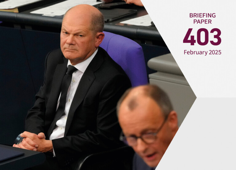 Cover photo for the publication. German Chancellor Olaf Scholz is sitting down with a concerned look on his face. Friedrich Merz, Leader of the Christian Democratic Union (CDU) and the CDU/CSU parliamentary group, appears in the foreground of the picture.