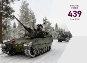 Cover page of the publication depicting two military tanks driving forward on a snowy road in a forest.
