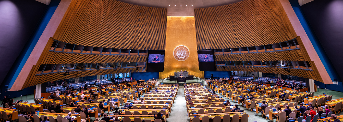 People attending a meeting in the UN General Assembly Hall